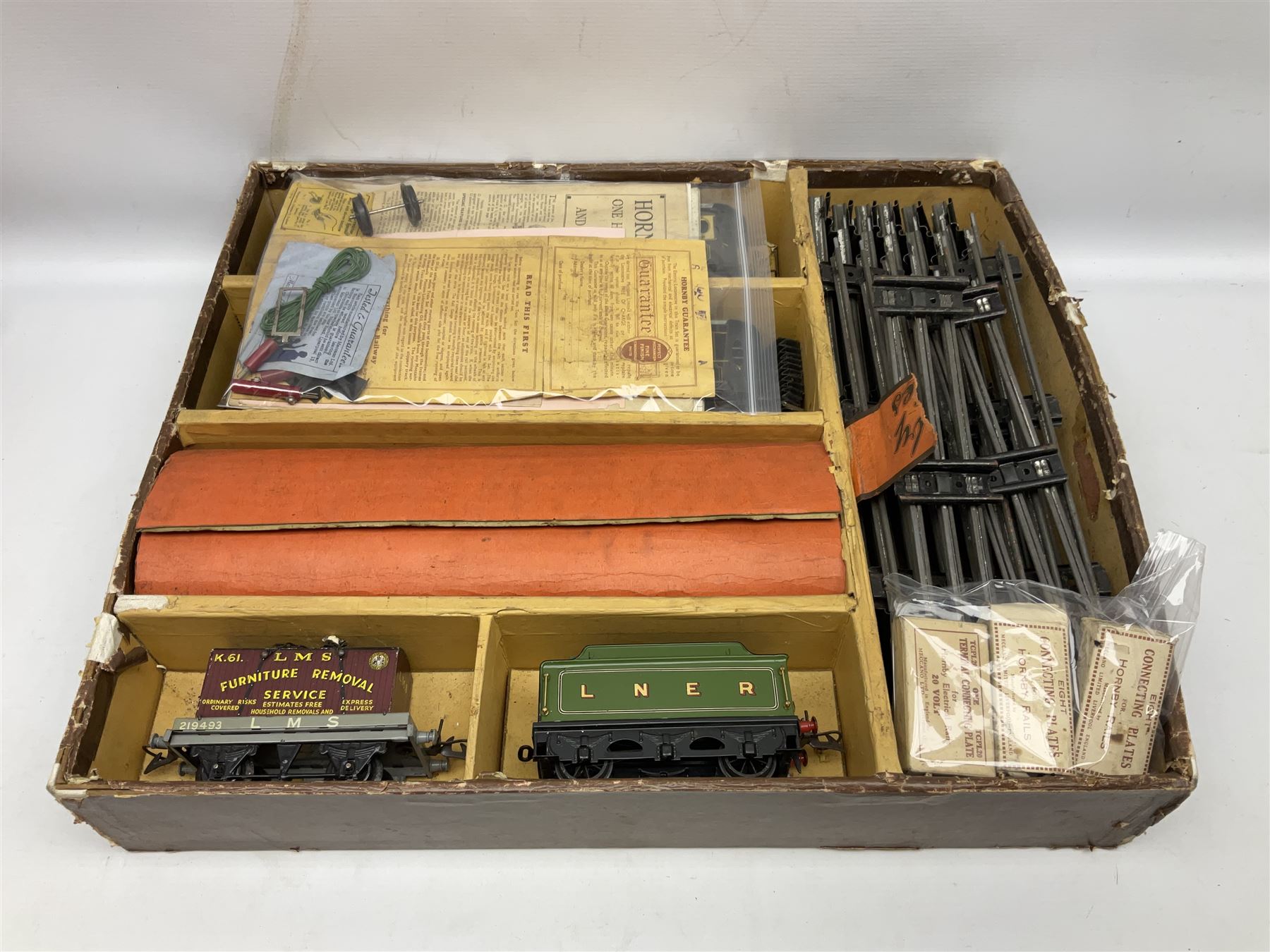 Hornby '0' gauge - three-rail electric train set with LNER Riviera Blue 4-4-2 locomotive 'Flying Scotsman' No.4472 and No.3 tender, No.2 Special Pullman Coach 'Loraine', No.2 Special Pullman Composite Coach 'Verona', goods wagon with Furniture Removals container, boxed Circuit Breaker, two boxes of Connecting Plates, boxed Terminal Connecting Plate and quantity of track; boxed with paperwork; together with Breakdown Van and Crane and Transformer No.T20A; both boxed