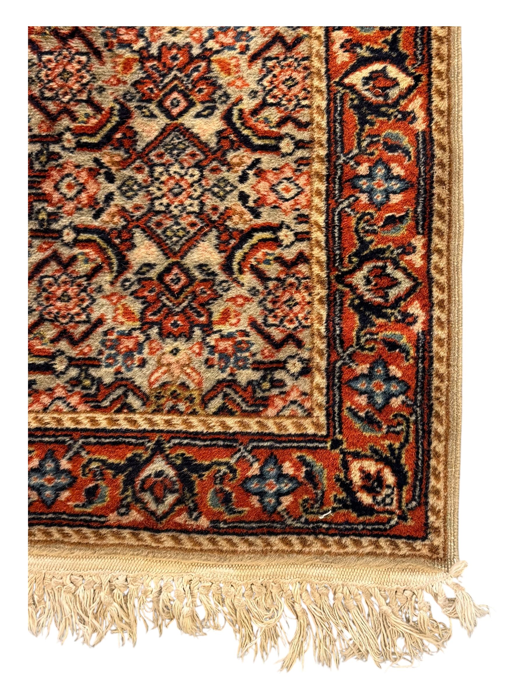 Persian-style wool rug, cream field with floral and geometric motifs, wide floral border (74cm x 142cm); Persian wool rug, beige field with dense floral patterns, narrow floral border (70cm x 144cm); Tribal wool rug, red and navy with diamond motifs (96cm x 60cm); Persian pictorial wool rug, black field with vase, birds, and floral border (70cm x 73cm)