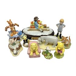 Nine Royal Doulton Winnie the Pooh Collection figures, including Oh Dear Bath Time's Here, Going Sledging, Tigger's Splash Time and Christopher Robin, together with a Royal Doulton Disney Showcase Jiminy Cricket figure, all boxed