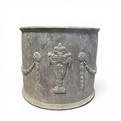 Pair of 19th century Neoclassical design lead garden planters of cylindrical form, the body decorated with an ornate central urn with swags and foliate design, flanked by festoons of bellflowers with roundel motifs