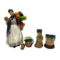Royal Doulton The Old Balloon Seller HN1315 and four Doulton miniature jugs
