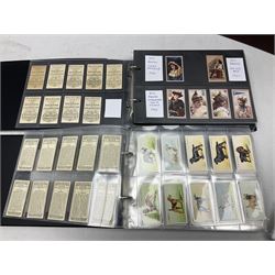 Quantity of mostly cigarette cards, housed in ring binder albums and loose, by Ardath, W.D. & H.O. Wills, John Player & Sons, The American Tobacco Co etc, including famous film stars, cinema stars, wild birds, poultry, dogs etc and various books or catalogues relating to cigarette card collecting, in one box