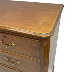 19th century inlaid mahogany chest, the canted rectangular top with applied moulded edge and parquetry banding, fitted with two short and three long graduating drawers enclosed by canted uprights, each drawer front inlaid with boxwood stringing and mahogany band, on bracket feet