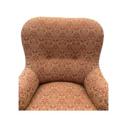 Late Victorian upholstered armchair, with high camel back and deep seat, padded arms and backrest in crimson and cream damask-style fabric, raised on turned ebonised front supports with ceramic castors (H88cm, W65cm, D 60m); and an Edwardian bedroom chair with button upholstered rail back (H72cm, D64cm, W53cm) (2)