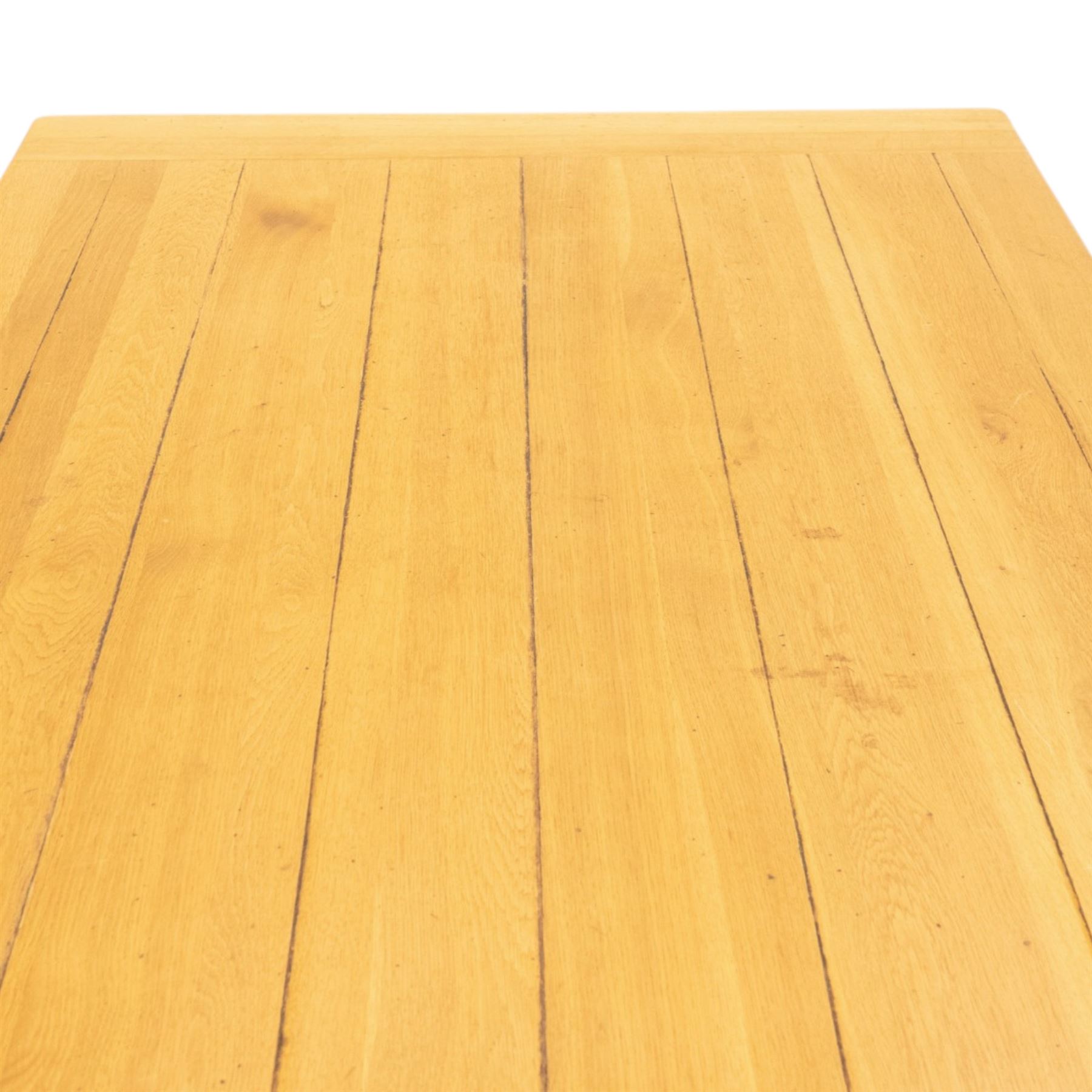 Late 20th century solid light oak dining table, on square supports