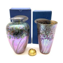 Two Art Glass Jonathan Harris vases, The first example of a baluster form, the second example of tapering cylindrical form,  each with iridescent decoration in tones of purple and blue, tallest example H18.5cm, each with makers box, together with a Isle of Wight glass paperweight. 