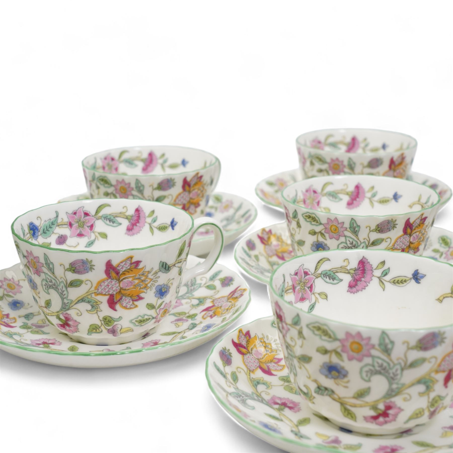 Minton Haddon Hall tea and dinner wares, including six cups and saucers, milk jug, six side plates (two different sizes), one sandwich plate, a large bowl and nine salad bowls 