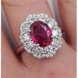 18ct white gold unheated oval ruby and round brilliant cut diamond cluster ring, hallmarked, ruby 3.07 carat, total diamond weight approx 1.65 carat, with WGI certificate