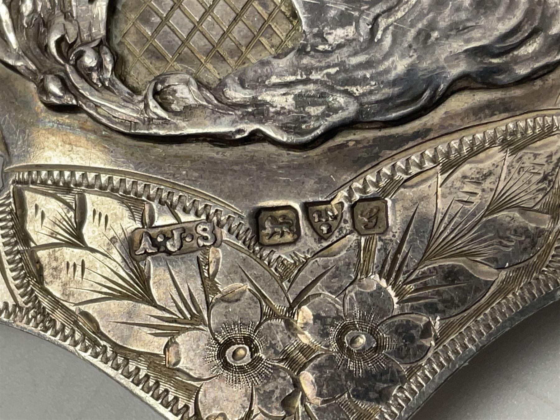 Art Nouveau silver belt, with two buckles, each depicting a female figure in profile and twelve engraved floral openwork panels, hallmarked Arthur Johnson Smith, Chester 1907, L60cm