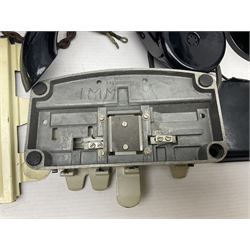 Collection of phone headsets, including GPO bakelite examples, together with other telephone parts 