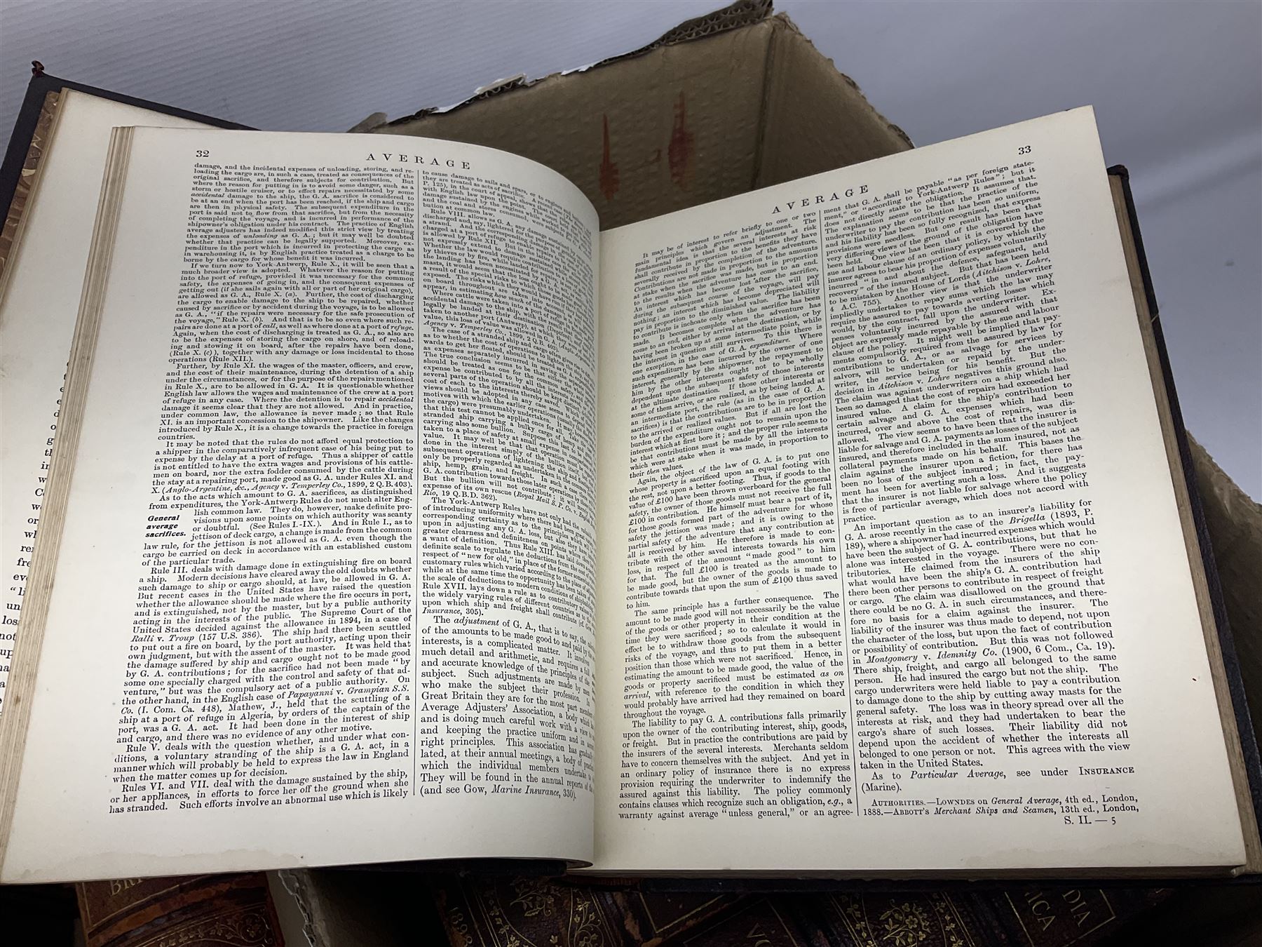 Thirty six volumes of Encyclopaedia Britannica with gold tooled red leather spines in various editions 