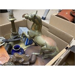 Quantity of brassware to include horse brasses, lamp and figures, wood pipes, horse bits, ceramics etc in two boxes