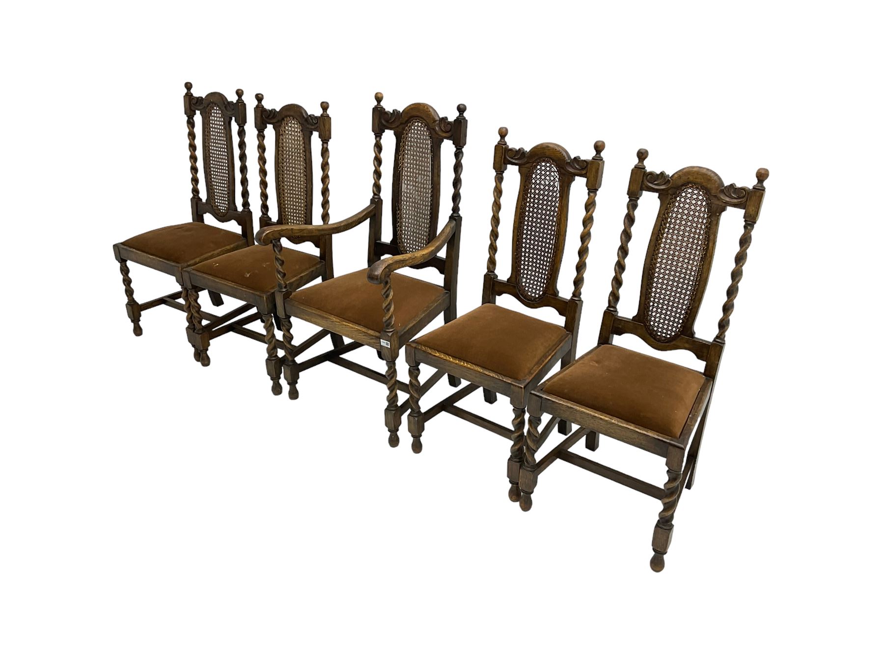 Set five early 20th oak barley twist dining chairs, spiral turned supports with oval cane-work backs, drop-in upholstered seats, on spiral turned supports joined by plain stretchers 