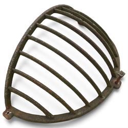 Victorian wrought iron wall-mounted stable hay rack of bowed cage form, with curved bars a...