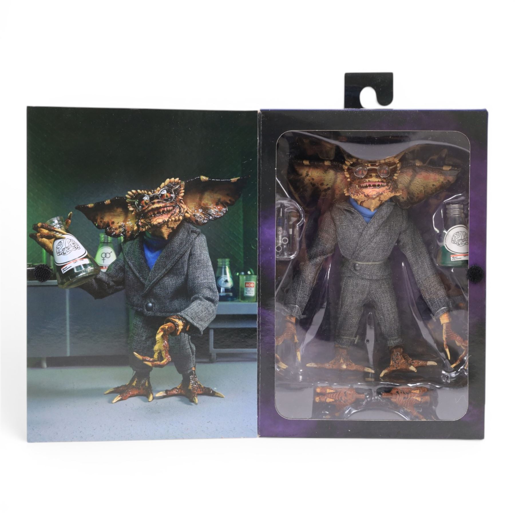Two Neca Gremlins figures, comprising Santa Stripe and Gizmo and Gremlins 2 Ultimate Brain, both boxed 