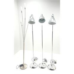 Four chrome metal standard lamps