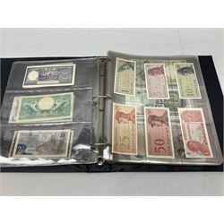 World banknotes, including Queen Elizabeth II The States of Jersey one pound 'DB202703', five pounds 'BB527762' and ten pounds 'AB651481', reserve bank of New Zealand two dollars '1L3 741894', King George V Straits Settlements one dollar 1st January 1935 'F/83 28924', various Bank of England notes etc, housed in two ring binder albums