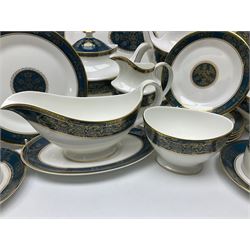 Royal Doulton Carlyle pattern tea and dinner service for six, to include teapot, coffee pot, teacups and saucers, coffee cups and saucers, milk jug, open sucrier, dinner plates, side plates, bowls, soup bowls, to covered dishes etc (64) 