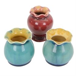 Collection of Linthorpe pottery vases, including pair of vases no 1558, tulip vase 1715 and six others  