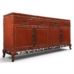 20th century Chinese ornately hardwood sideboard, rectangular top over four drawers above ...