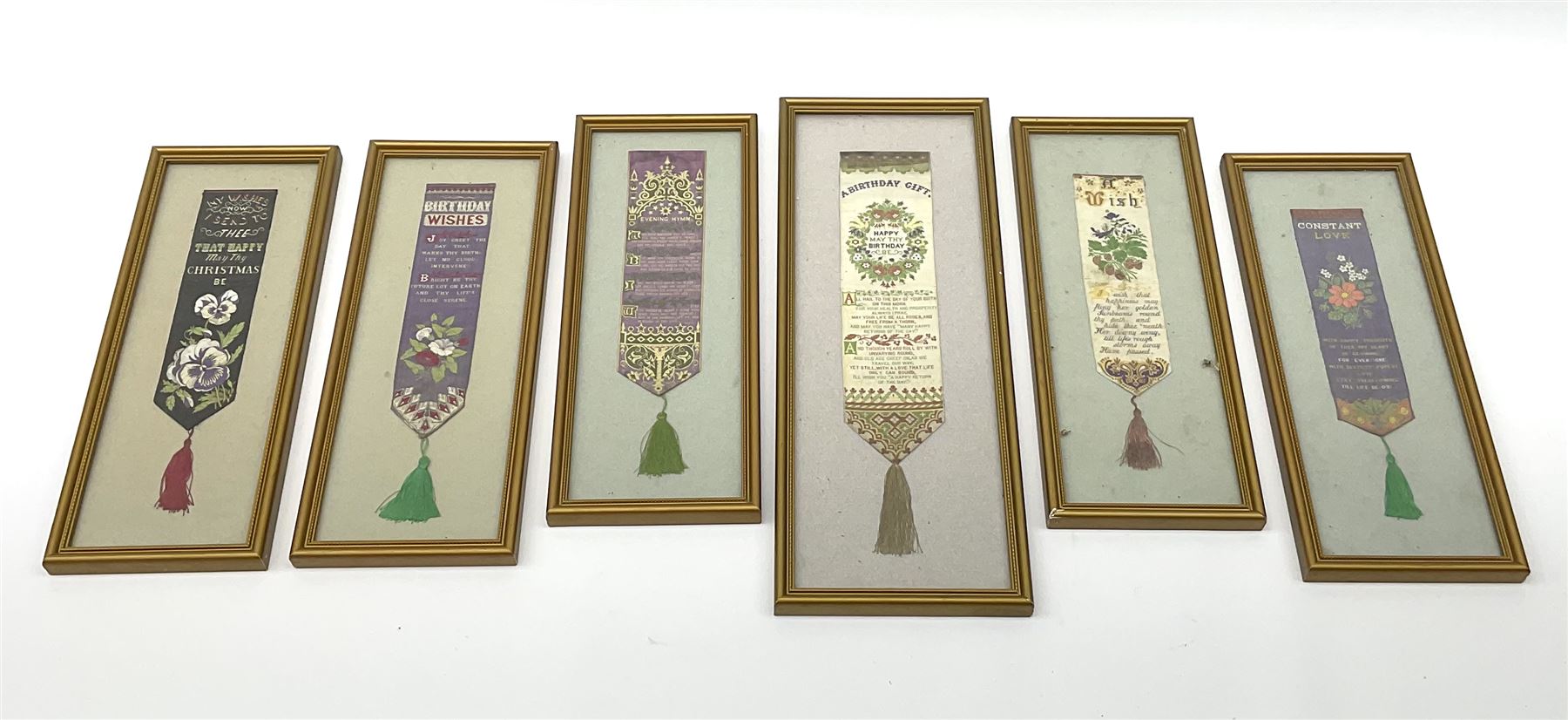 Six framed and glazed Stevengraph silk bookmarks, largest overall H33cm L13cm.