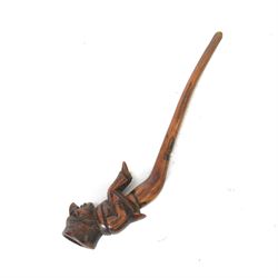 Carved novelty wooden pipe, the carved as a seated man, 
by venders repute, belonging to ...