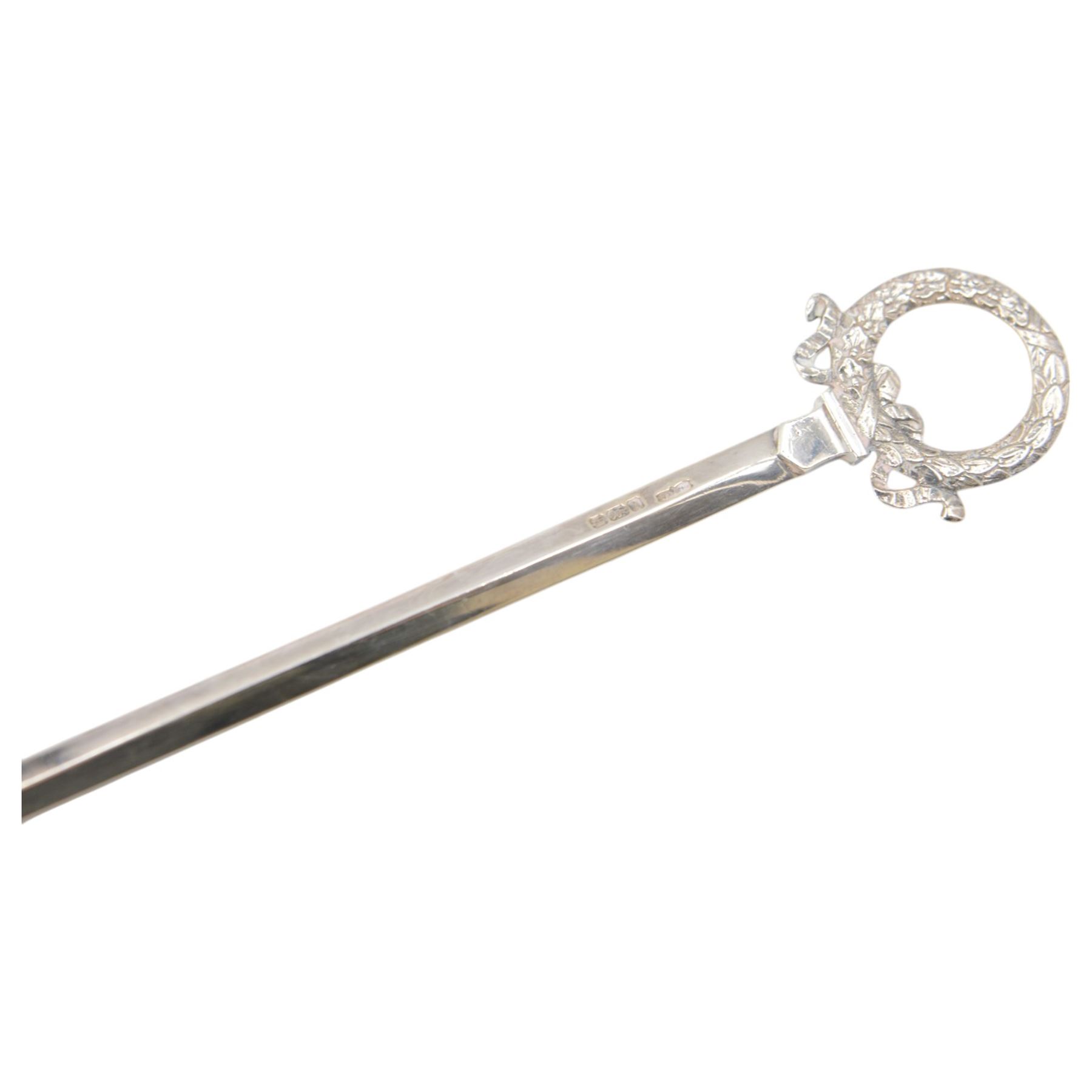 Edwardian silver meat skewer, with wreath loop handle, hallmarked James Dixon & Sons Ltd, Sheffield 1902, together with a late 20th century silver mounted bottle coaster with turned wooden centre, hallmarked W I Broadway & Co, Birmingham 1982, coaster D13cm