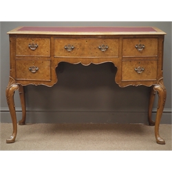  Queen Anne style walnut burr writing desk, red leather inset top, serpentine front, one long and four short drawers, shaped apron, carved shells, cabriole supports, W108cm, H76cm, D56cm  
