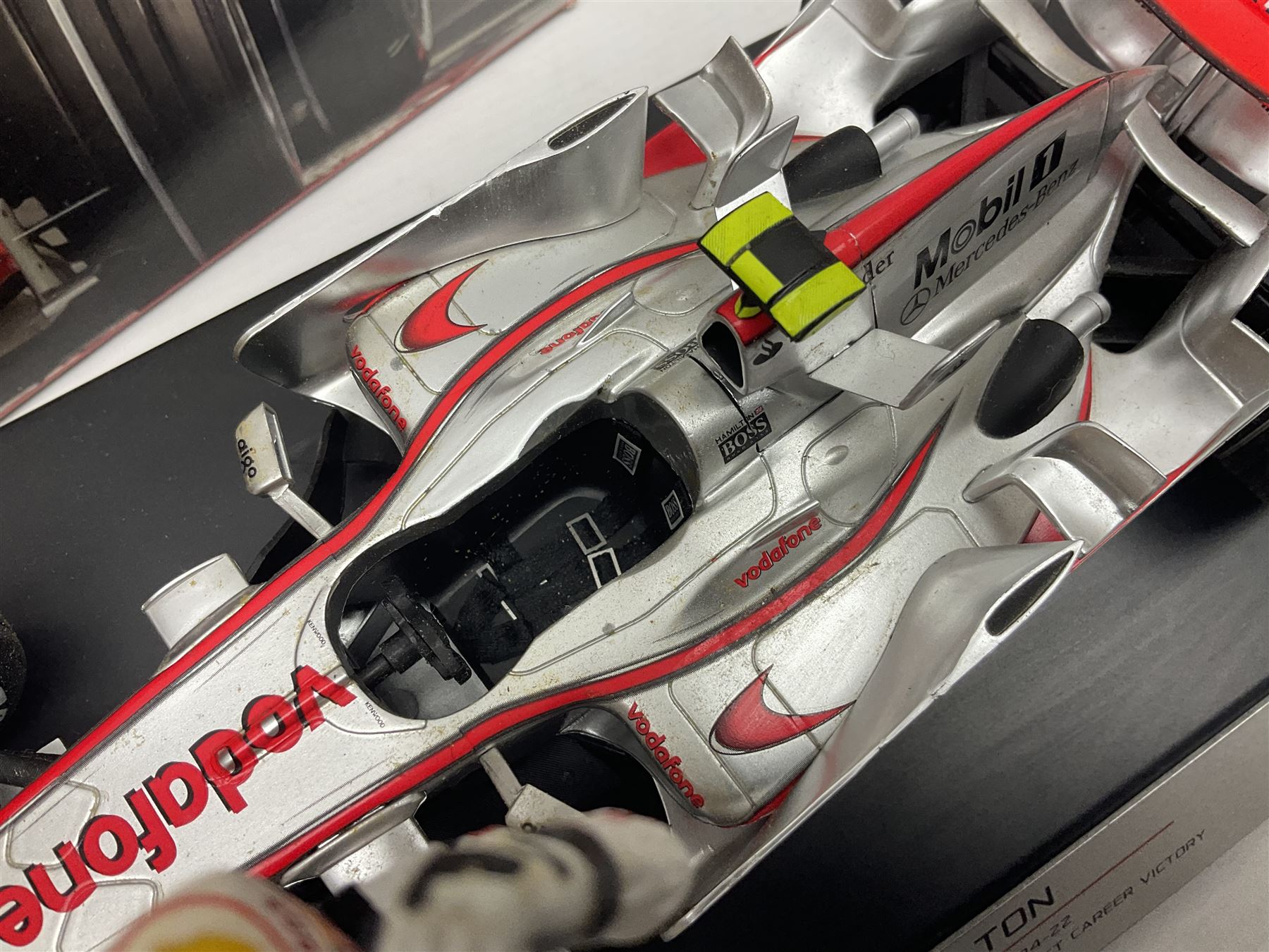Mattel Hot Wheels 1:18 scale die-cast racing car - Vodaphone McLaren Mercedes; boxed with stand