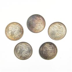 Five United States of America silver Morgan dollar coins, dated 1882, 1883, 1884 O, 1885 and 1889