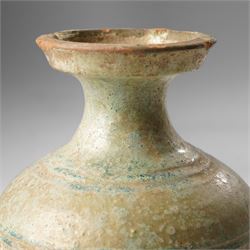 Green glazed 'Hu' jar, probably Han Dynasty, with flared rim H15.5cm 