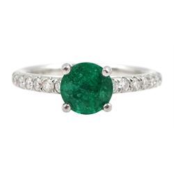 Platinum round emerald ring, with diamond set shoulders, hallmarked, emerald approx 0.80 carat