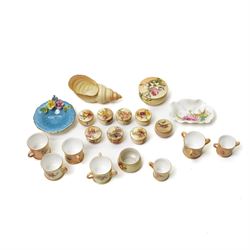 Large collection of miniature Royal Worcester hand-painted blush ivory wares, including sh...