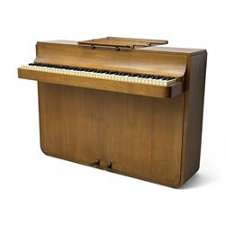 Louis Zwicki - mid-20th century oak cased compact piano, fitted with a folding music rest and full keyboard, dual brass pedals