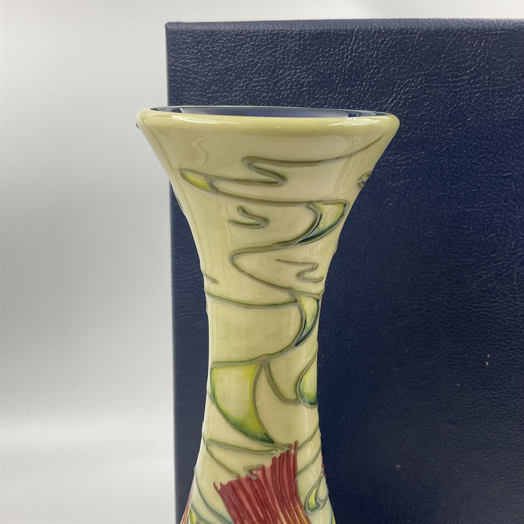 Moorcroft vase, of bottle form, decorated in the Orchid Arabesque pattern by Emma Bossons, circa 2002, H31.5cm, with original box 