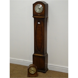  Early 20th century oak granddaughter clock, silvered dial Arabic movement enclosing a 'Smith's' electric movement (H134cm) and a oak eight day mantle clock with German movement striking on a gong (2)  