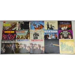  Collection of vinyl LP's incl. The Beatles Rock 'N' Roll Music Vol. 1 & 2, Please Please Me, Rolling Stones Sticky Fingers, Beggars Banquet, Bedspring Symphony, A Box Lunch and Meat Whistle Live in Concers and others, Status Quo, Abba, Elton John, Meat Loaf, Fleetwood Mac Rumours, Pink Floyd Dark Side of the Moon 1973, complete with posters and stickers, singles and other music in box and case  