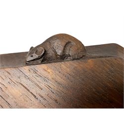 Mouseman - adzed oak breadboard, canted rectangular form with moulded edge carved with mouse signature, by the workshop of Robert Thompson, Kilburn, W30.5cm D25cm