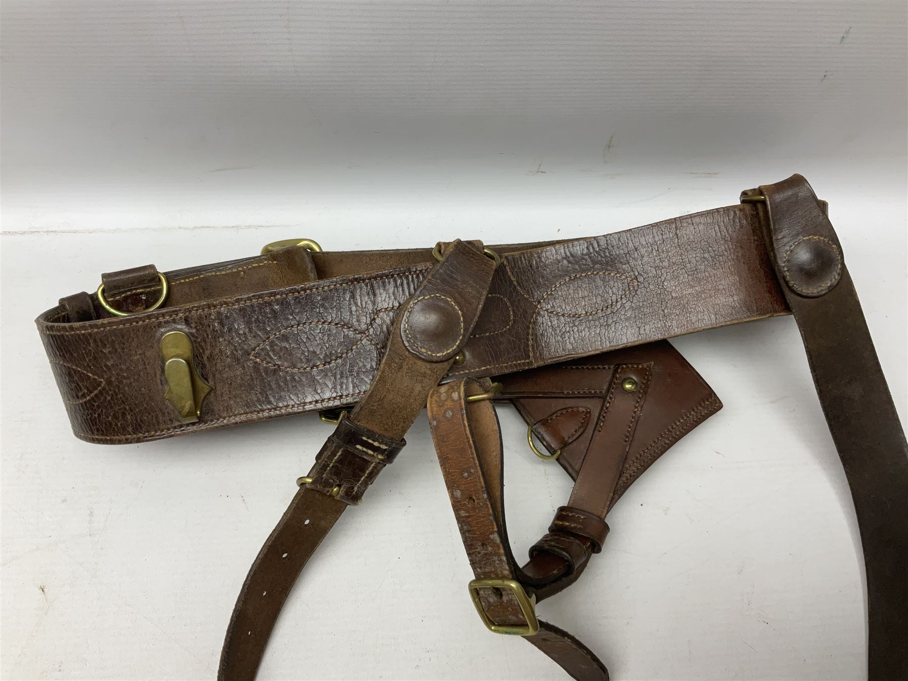 Pair of WW1 style Army Officer's brown leather full leg riding boots with Alkit four-piece wooden boot trees; and two officer's Sam Browne leather belts with cross-straps, one with sword frog (4)