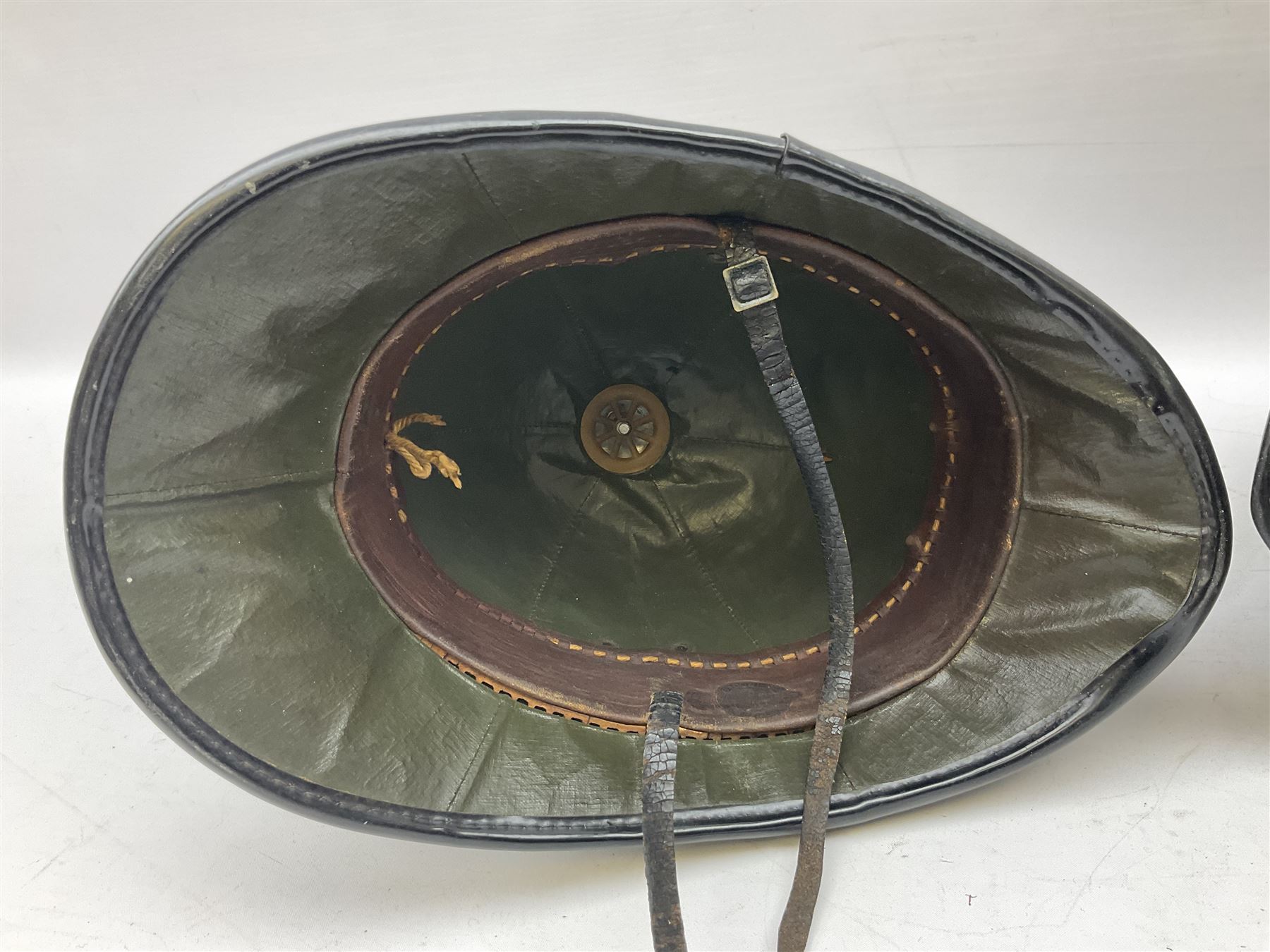 Hull City Police - helmet with king's crown night plate; two further ball-top helmets with Queen's crown plates; and a peaked cap (4)