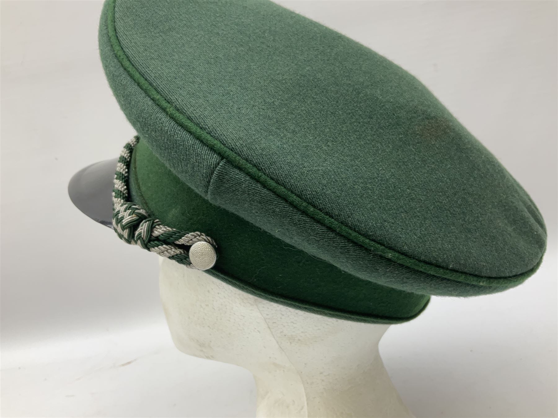 Five reproduction German WW2 hats comprising Wehrmacht olive tropical helmet, Heer officer's peaked cap, two M43 caps and Field side cap (5)