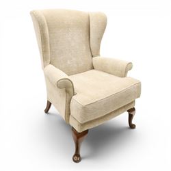 Parker Knoll - 'Hartley' lounge suite, comprising three wingback armchairs and two-seat settee, upholstered in cream fabric, shaped wing backs with scroll-over arms and loose seat cushions, on cabriole supports with pad feet wingbacks and settee

Armchairs: H 96cm, D 83cm, W 75cm