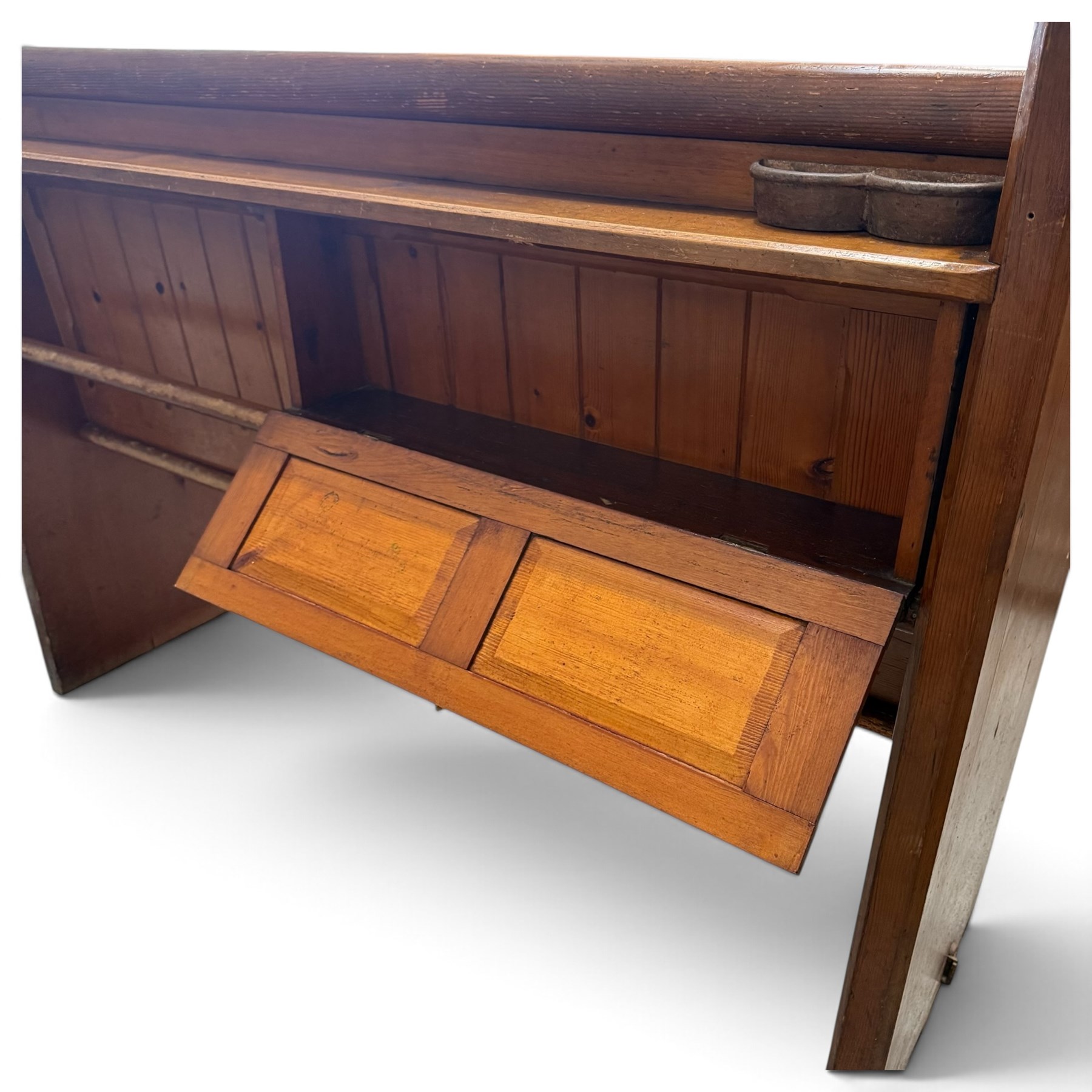 Early 20th century stained pine ecclesiastical church pew, the shaped end supports flanking slatted and panelled back, with black stencilled number '17' to the side